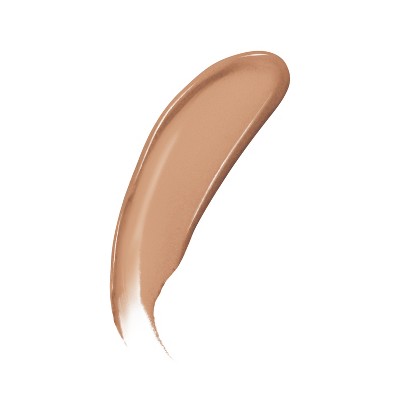 Swatch of tan liquid foundation makeup on skin.