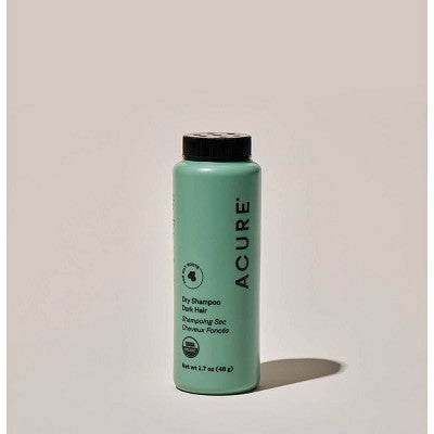 Acure dry shampoo bottle, teal-green bottle with black cap
