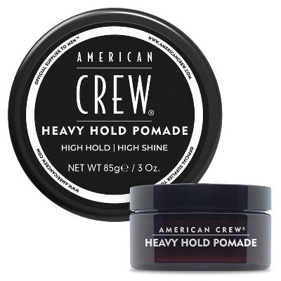 Round pomade lid and dark jar with American Crew heavy hold pomade label, 3 oz