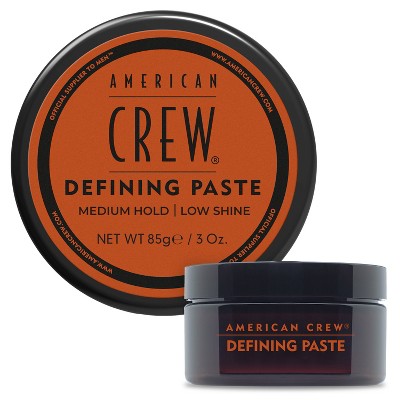 American Crew Defining Paste hair gel paste jar and lid, black cap with orange branding