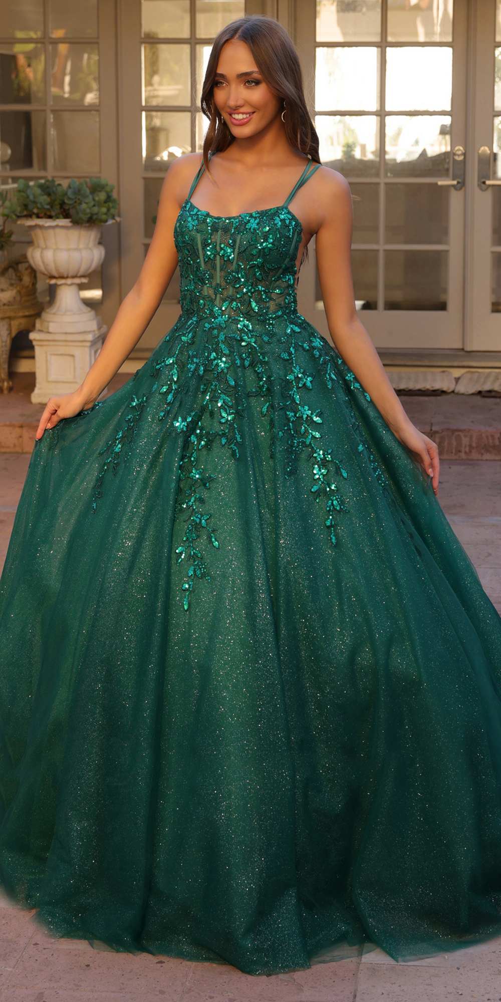 Teal green glitter tulle ballgown with scoop neckline and thin straps, flared A-line skirt