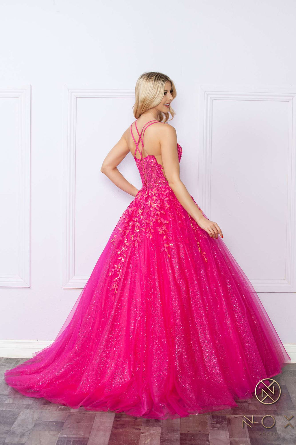 Fuchsia glitter tulle ballgown with scoop neckline and crisscross open back, full skirt