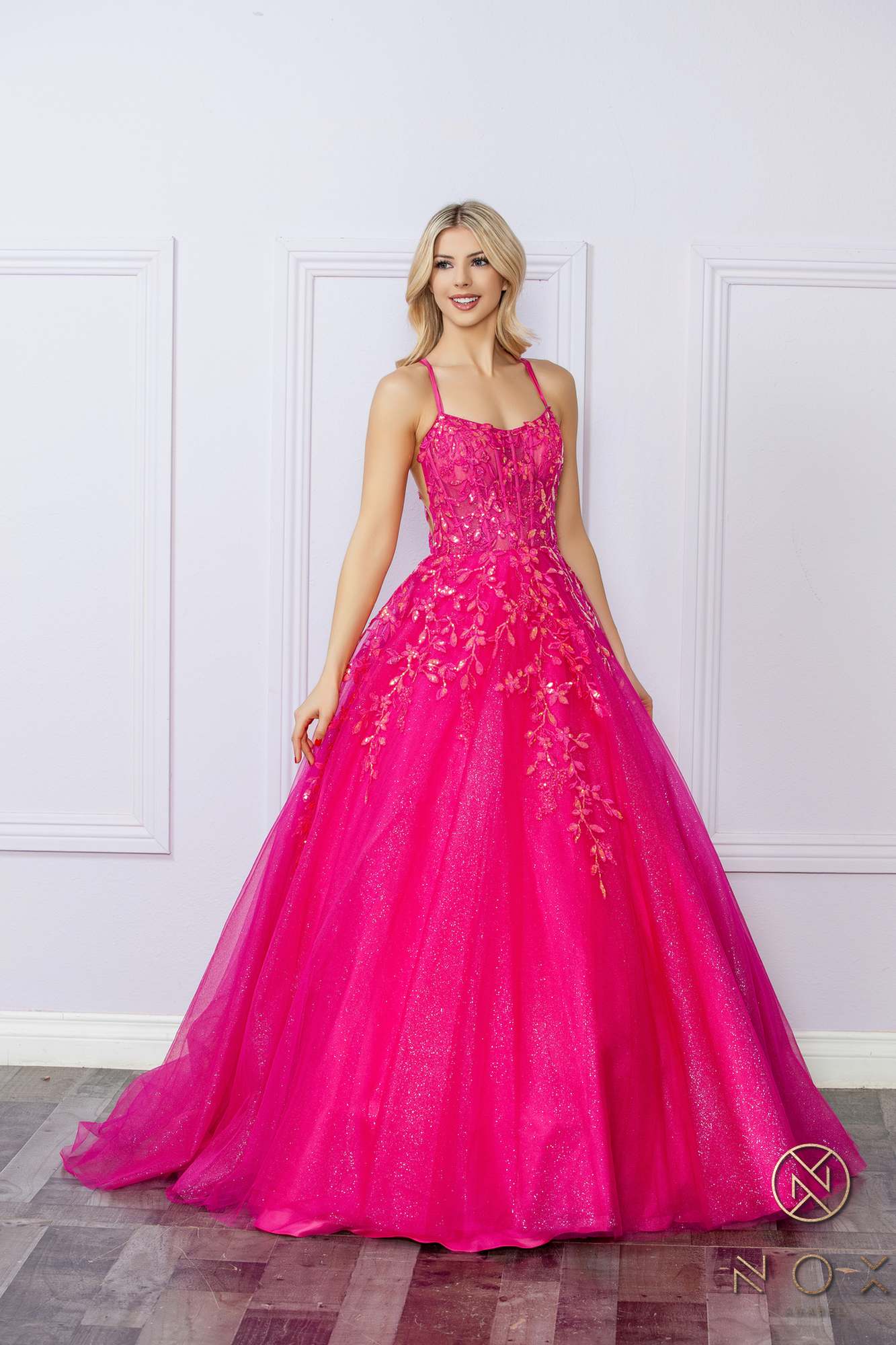 Fuchsia glitter tulle ballgown with scoop neckline, thin spaghetti straps, full A-line silhouette