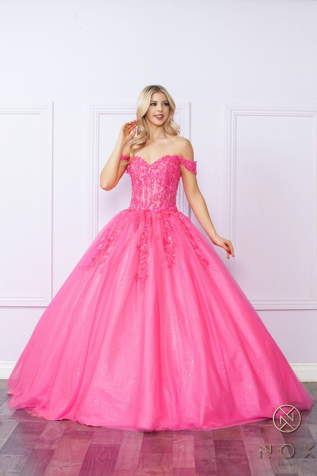 Hot pink off-shoulder ballgown with sparkling bodice and full voluminous skirt