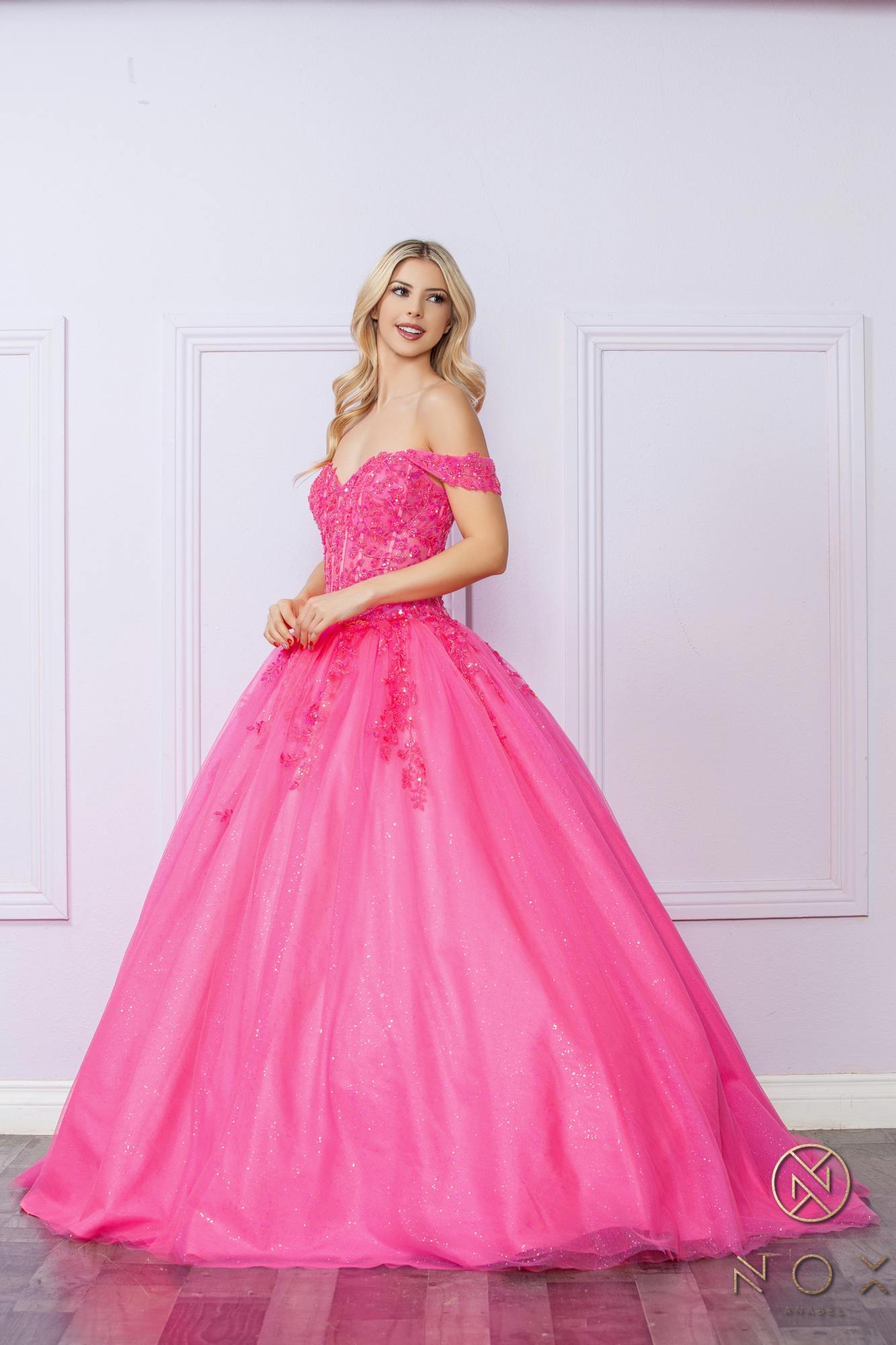 Hot pink off-shoulder sequined bodice with gathered tulle ballgown skirt