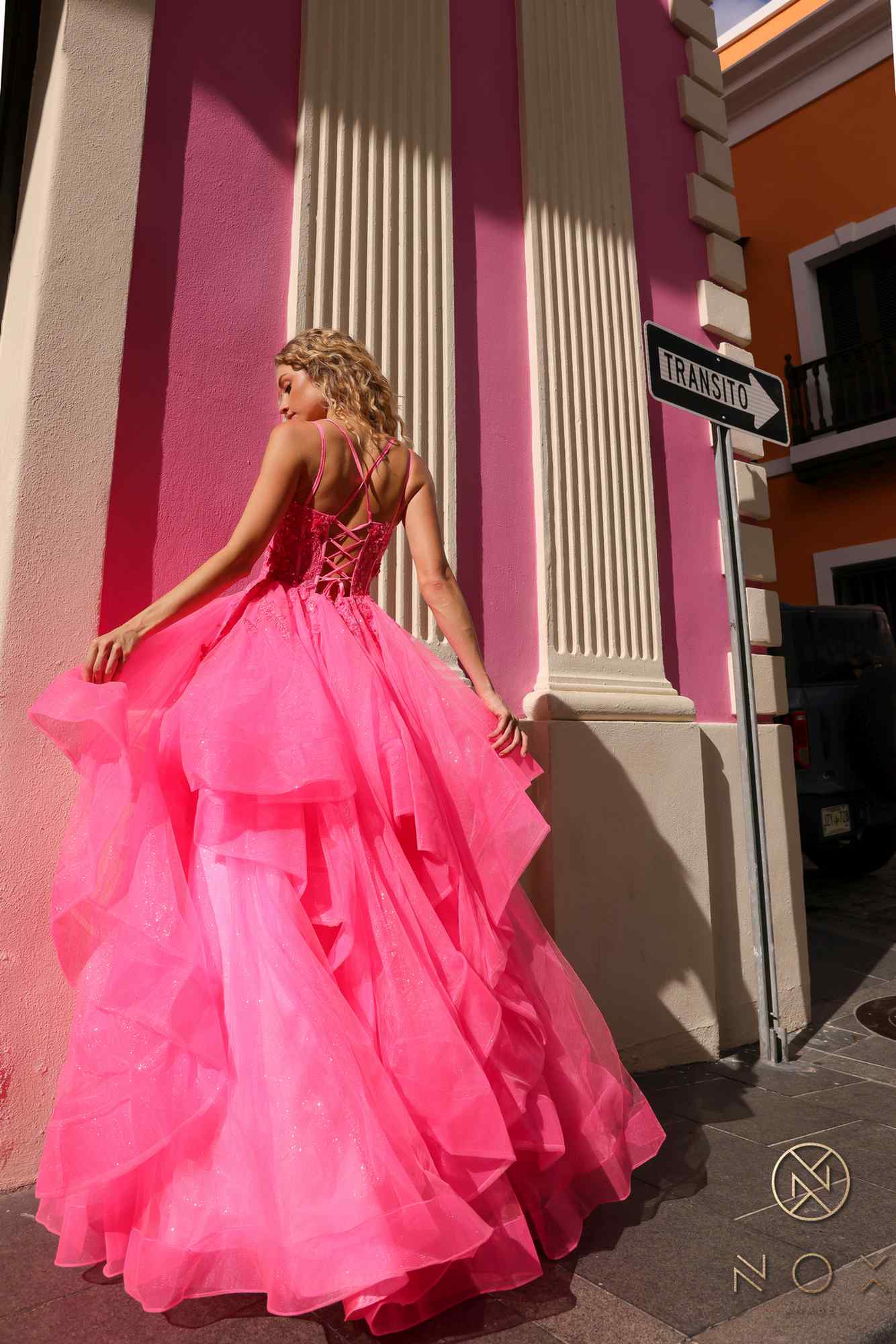 Pink tulle ballgown with layered tiered ruffles and open-back detail, A-line