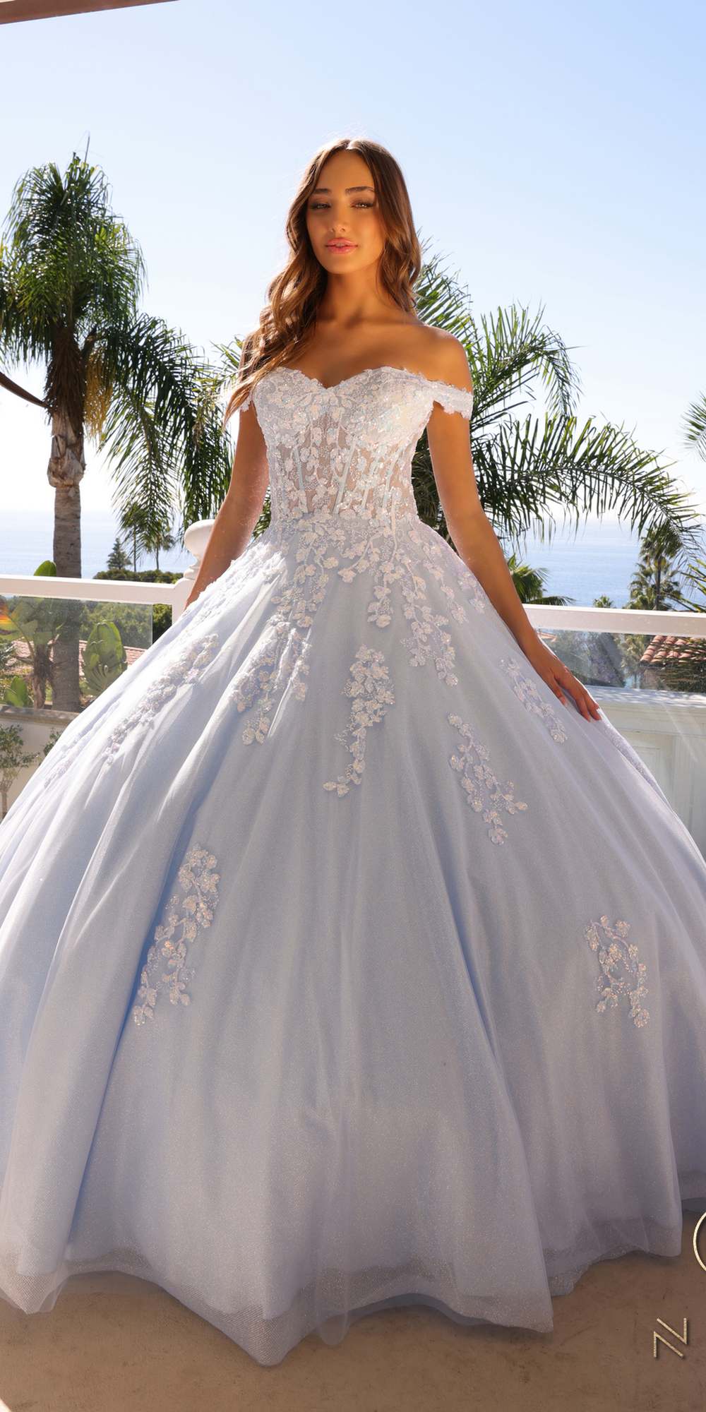 Ivory off-shoulder ballgown with lace-appliqué bodice and full tulle skirt
