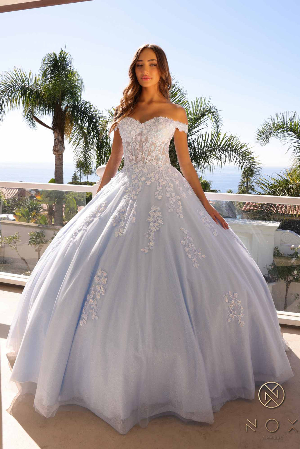 Ivory off-shoulder ballgown with sweetheart neckline and embroidered lace details