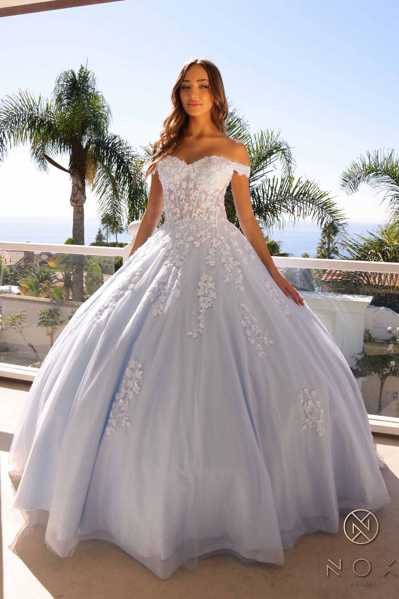 Ivory off-shoulder ballgown with sweetheart neckline and embroidered lace details