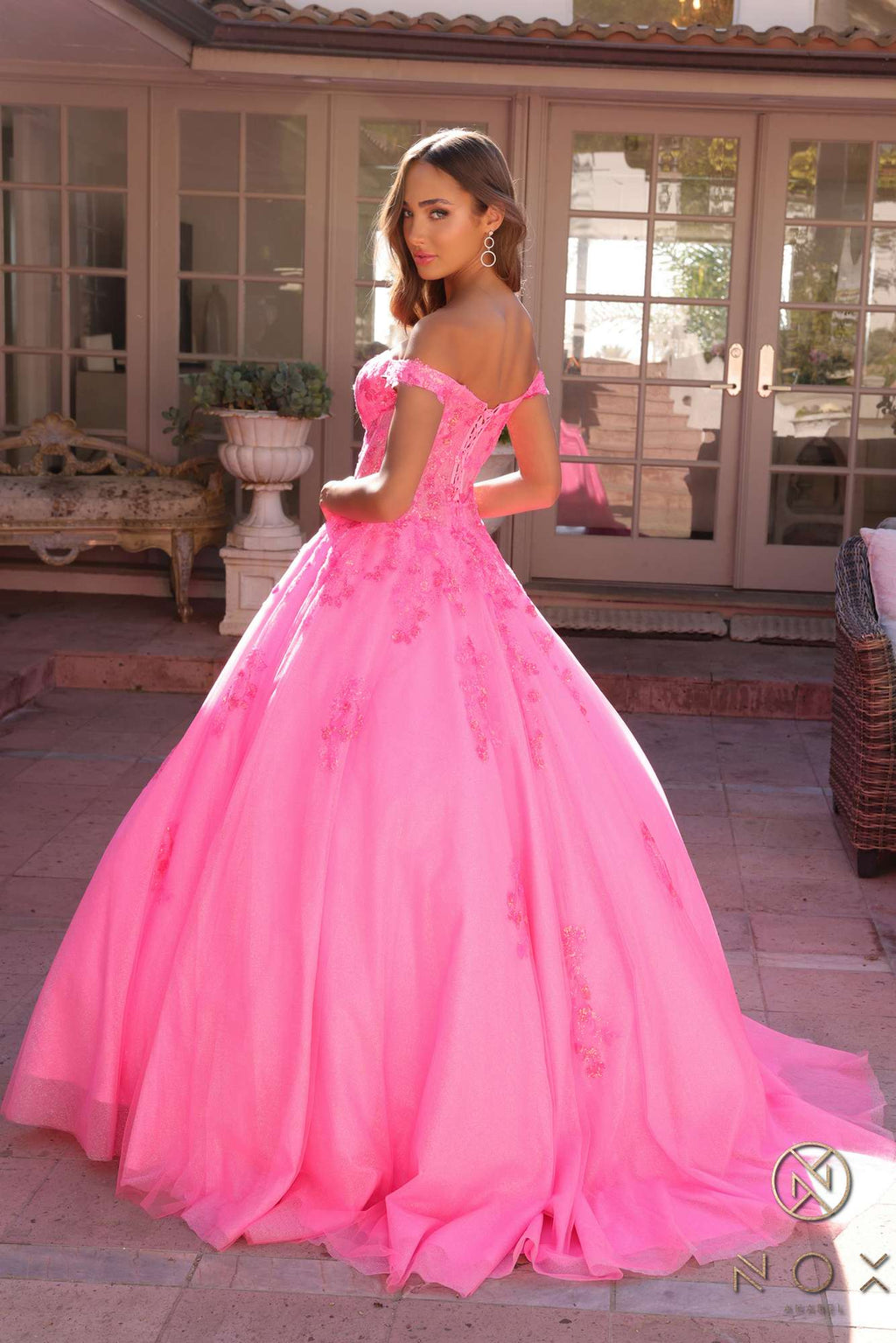 Hot pink off-shoulder ballgown with sweetheart neckline, fitted bodice, full tulle skirt