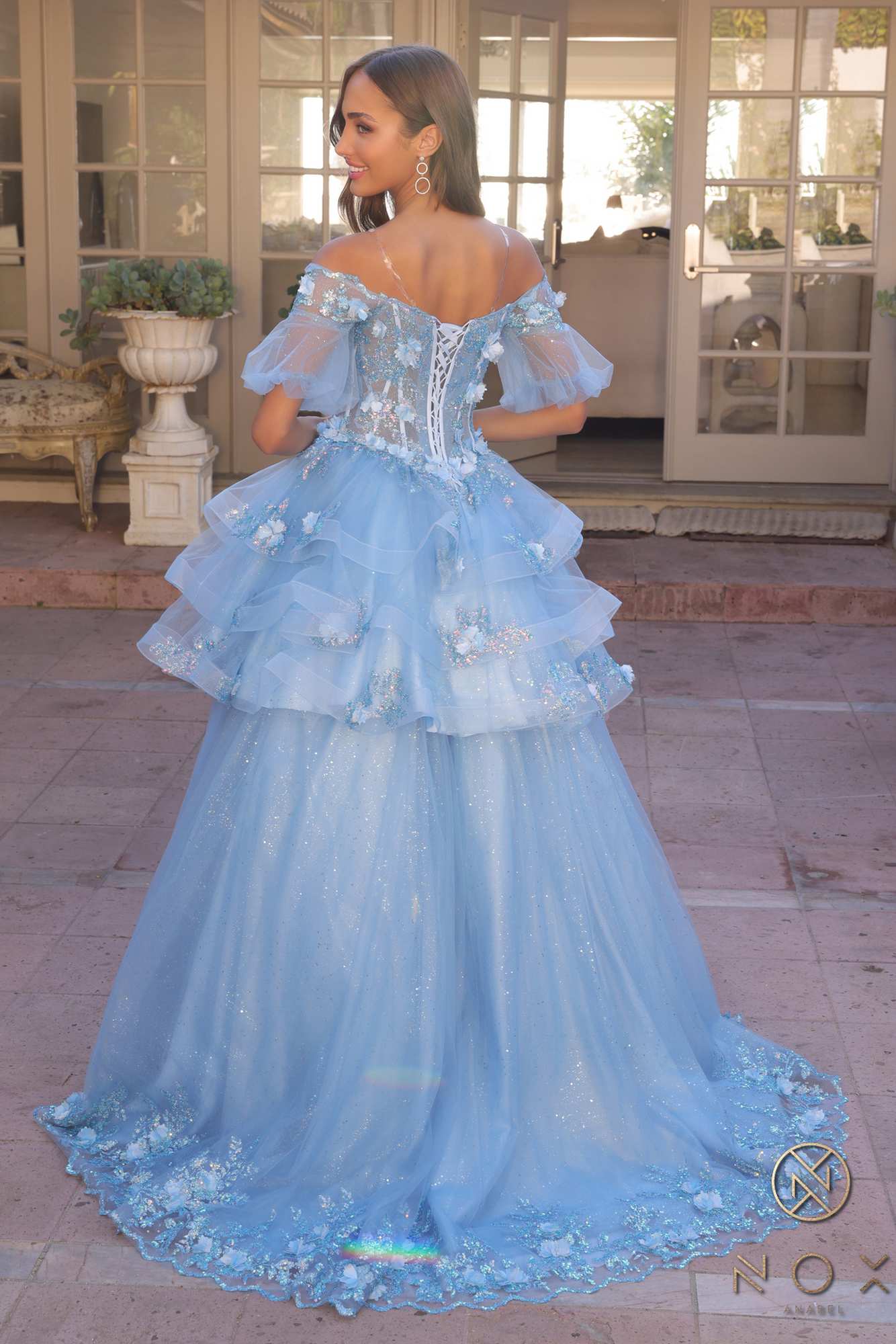 Blue off-shoulder A-line gown with 3D floral lace bodice and layered ruffle skirt