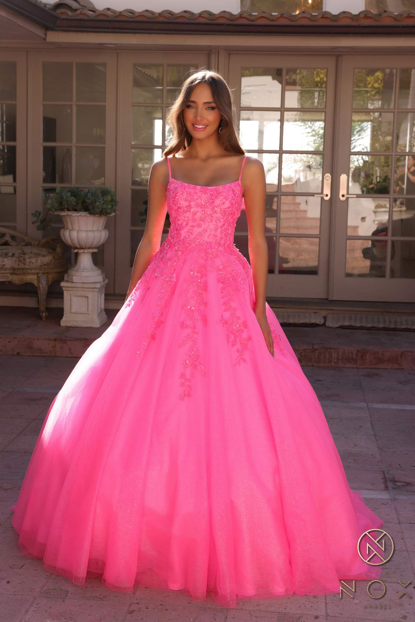 Hot pink square-neck A-line quinceanera gown, lace-embellished bodice, full tulle skirt