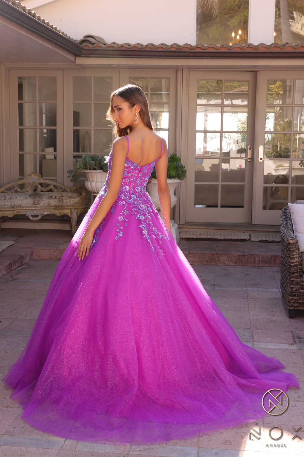 Hot pink square-neck A-line quinceanera gown with lace bodice and voluminous tulle skirt