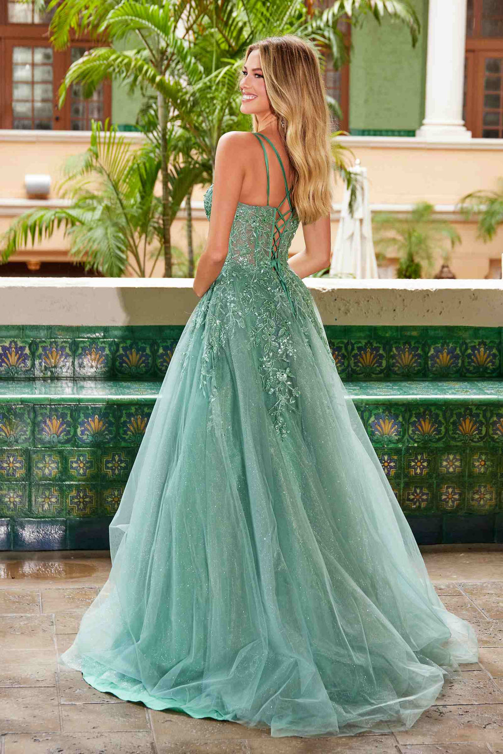 Sage green A-line sweetheart neckline dress with floral applique on tulle skirt