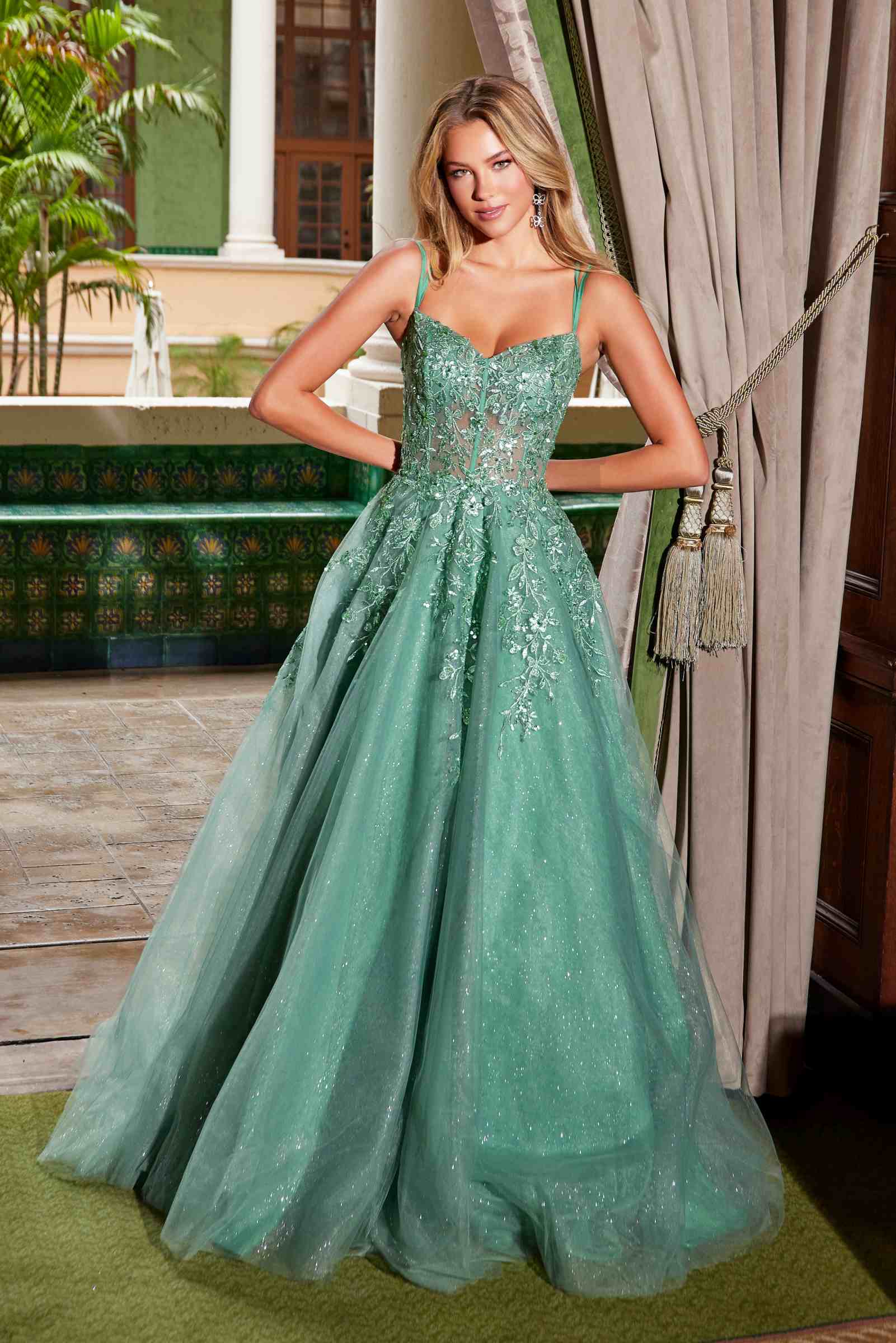 Sage green A-line sweetheart neckline dress with sparkly floral applique and full skirt
