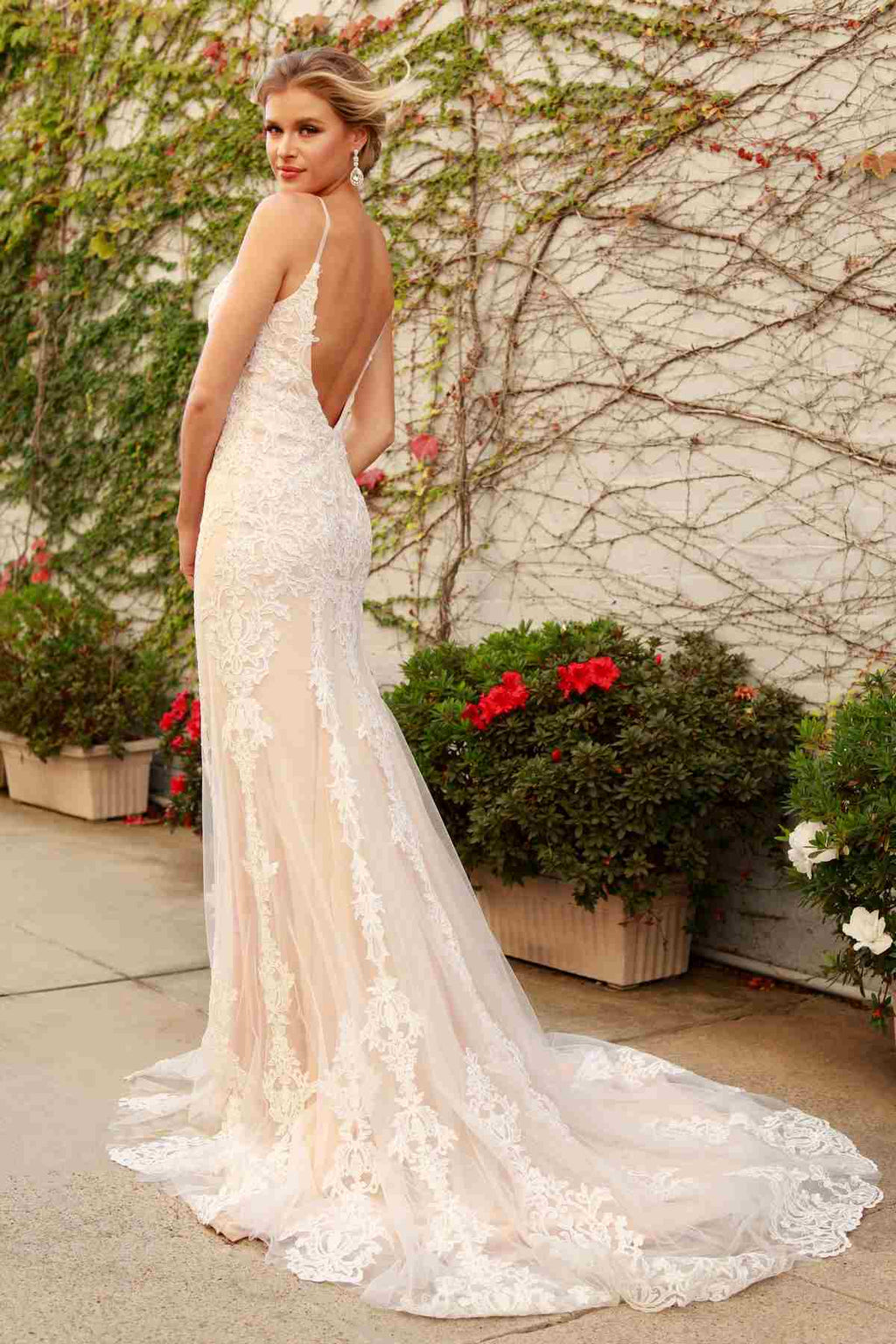 Spaghetti-strap V-neck lace wedding gown in a fitted mermaid shape with long train