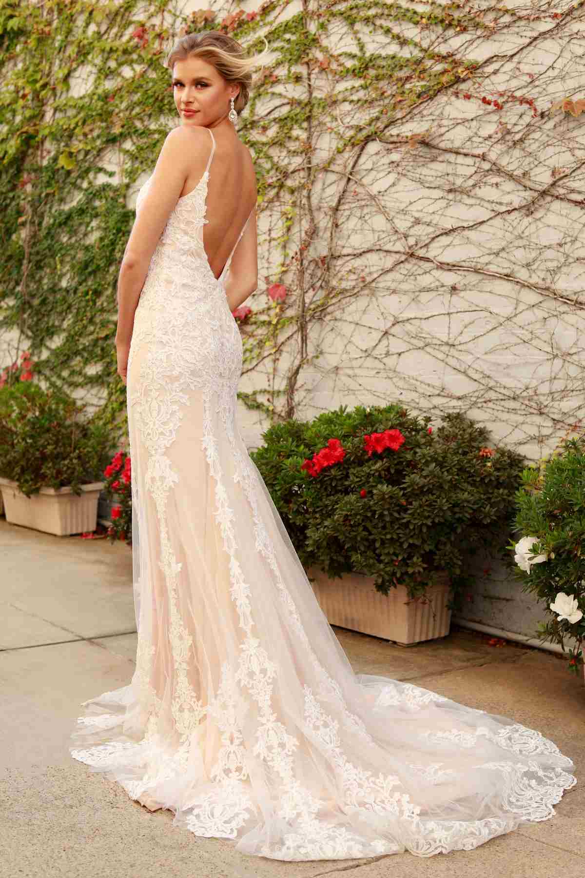 Spaghetti-strap V-neck lace wedding gown in a fitted mermaid shape with long train