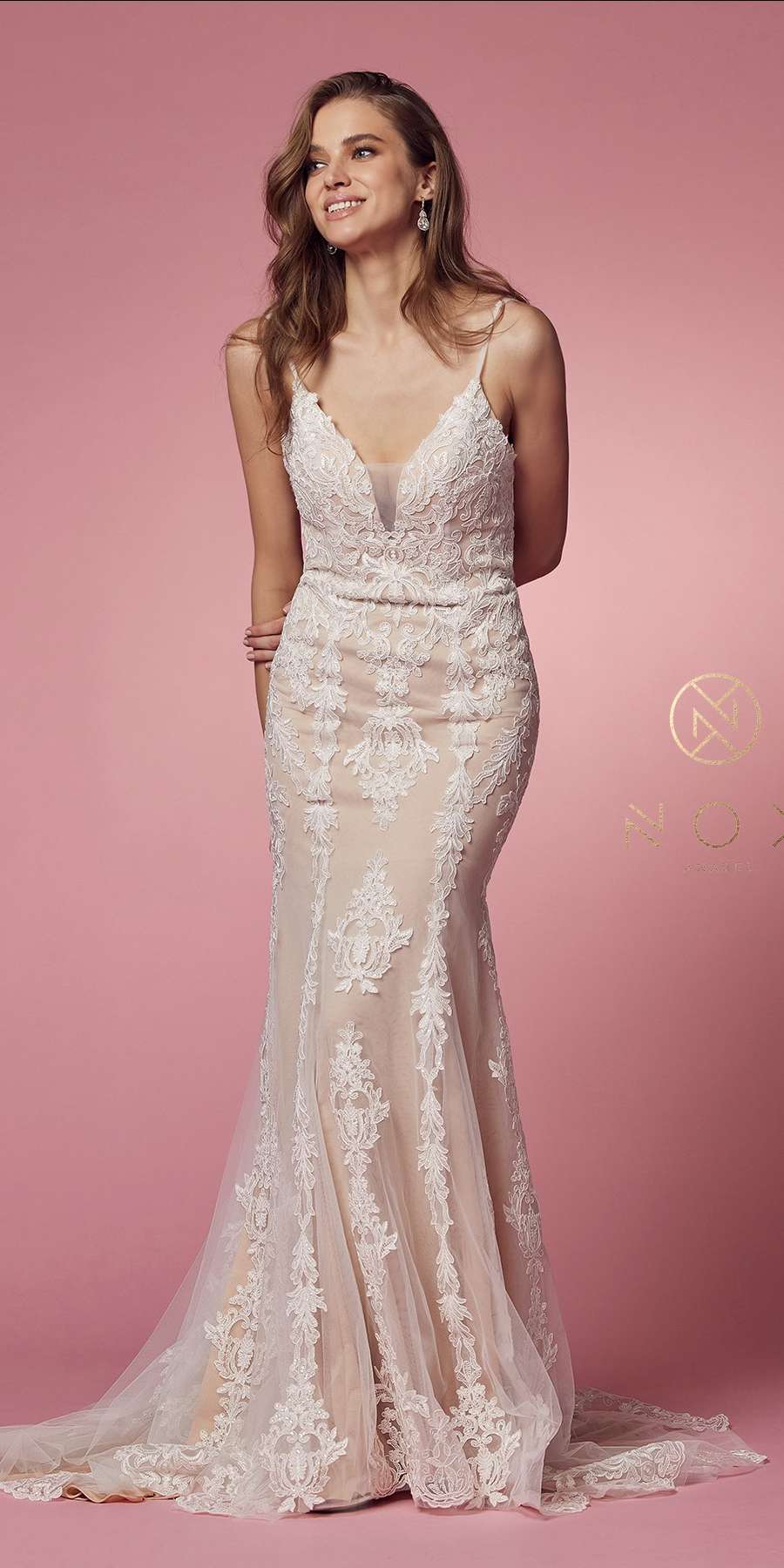Spaghetti-strap V-neck lace wedding gown with fitted mermaid silhouette and long train