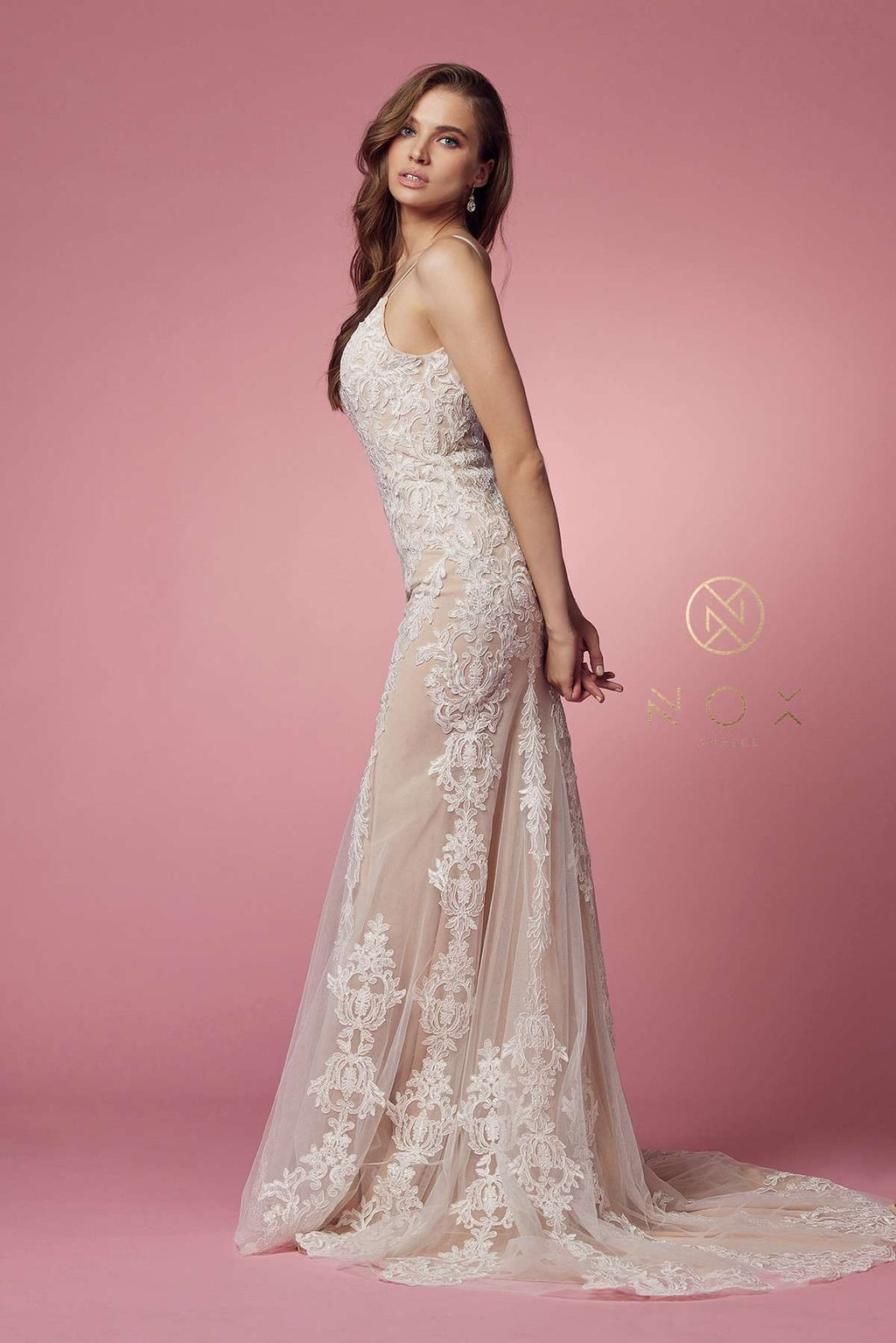 Spaghetti-strap V-neck lace wedding gown with fitted silhouette and lace-trimmed hem