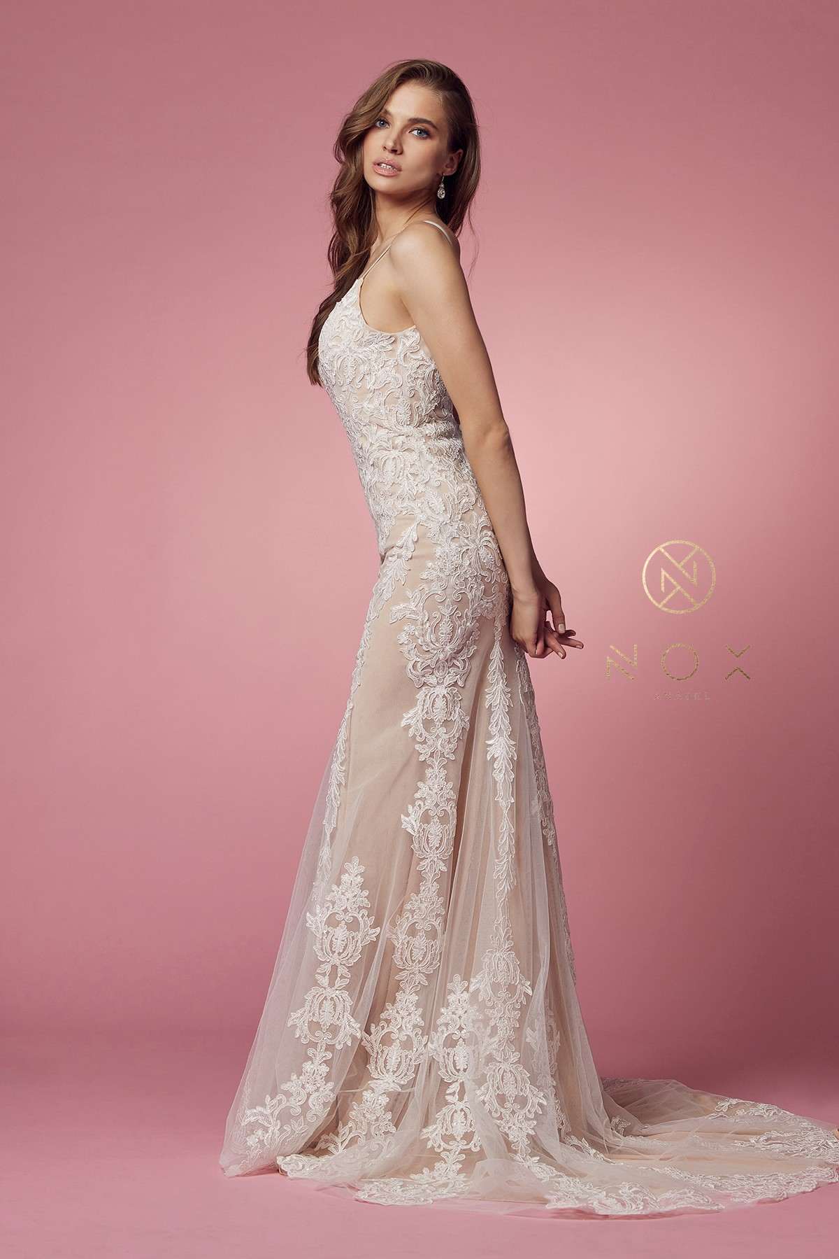 Spaghetti-strap V-neck lace wedding gown with fitted silhouette and lace-trimmed hem