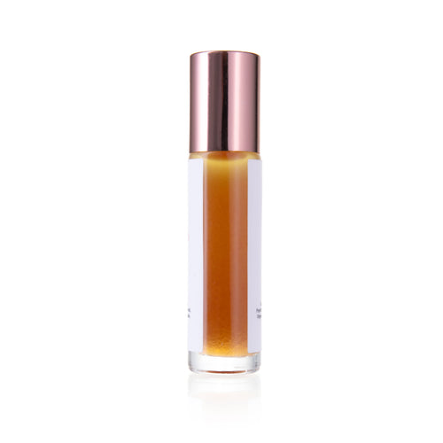 Hydrating eye serum bottle with rose-gold cap and clear amber liquid