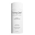 Leonor Greyl hair oil bottle, white cylindrical bottle with label