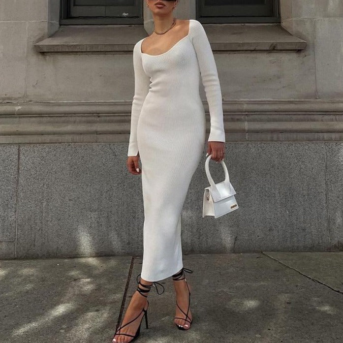 White ribbed bodycon maxi dress with long sleeves and scoop neckline, side slit