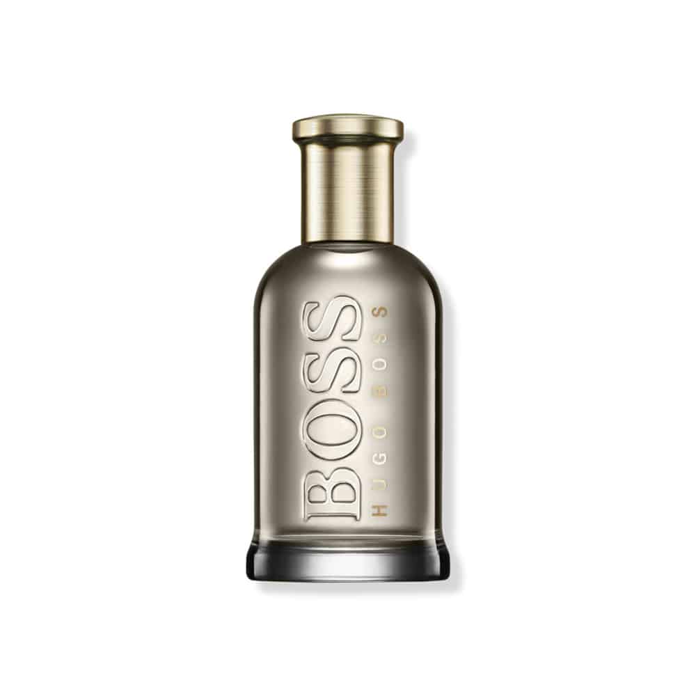 Perfume bottle with silver body, gold cap, and embossed BOSS lettering