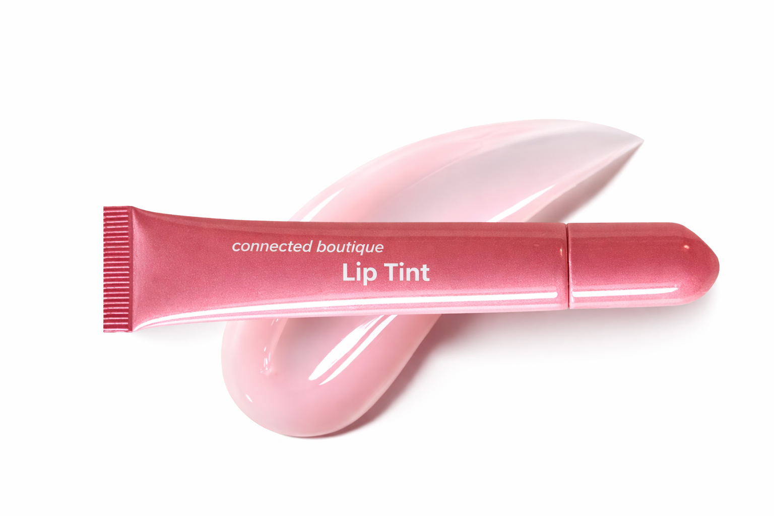 Lip tint tube in light pink with glossy swatch and squeeze applicator tip