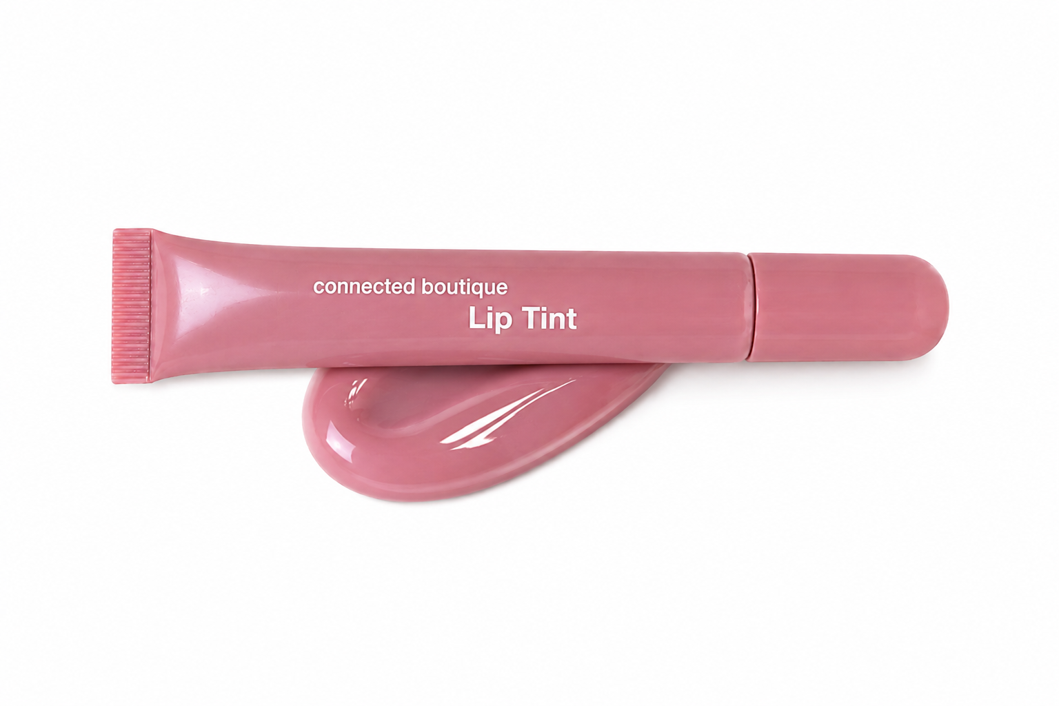 Lip tint tube in dusty rose pink with glossy swatch and squeeze applicator tip