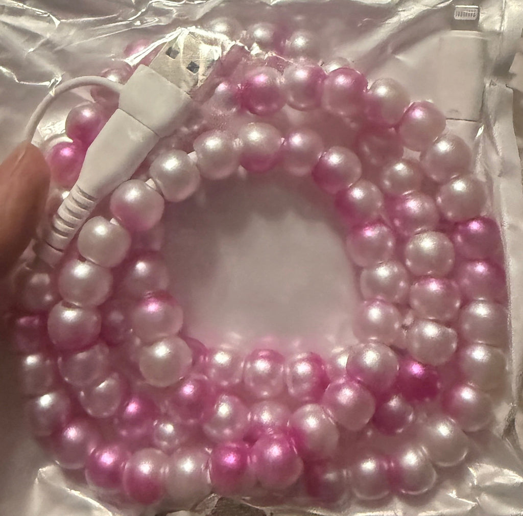 Beaded 4-in-1 charging cable with iridescent pink and white beads, dual connectors visible