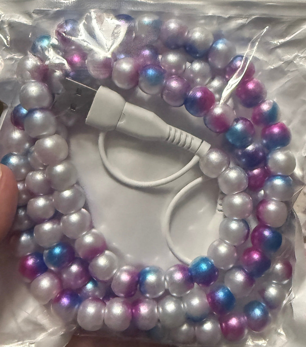Beaded 4-in-1 charging cable with silver, purple, and blue iridescent beads, connectors shown