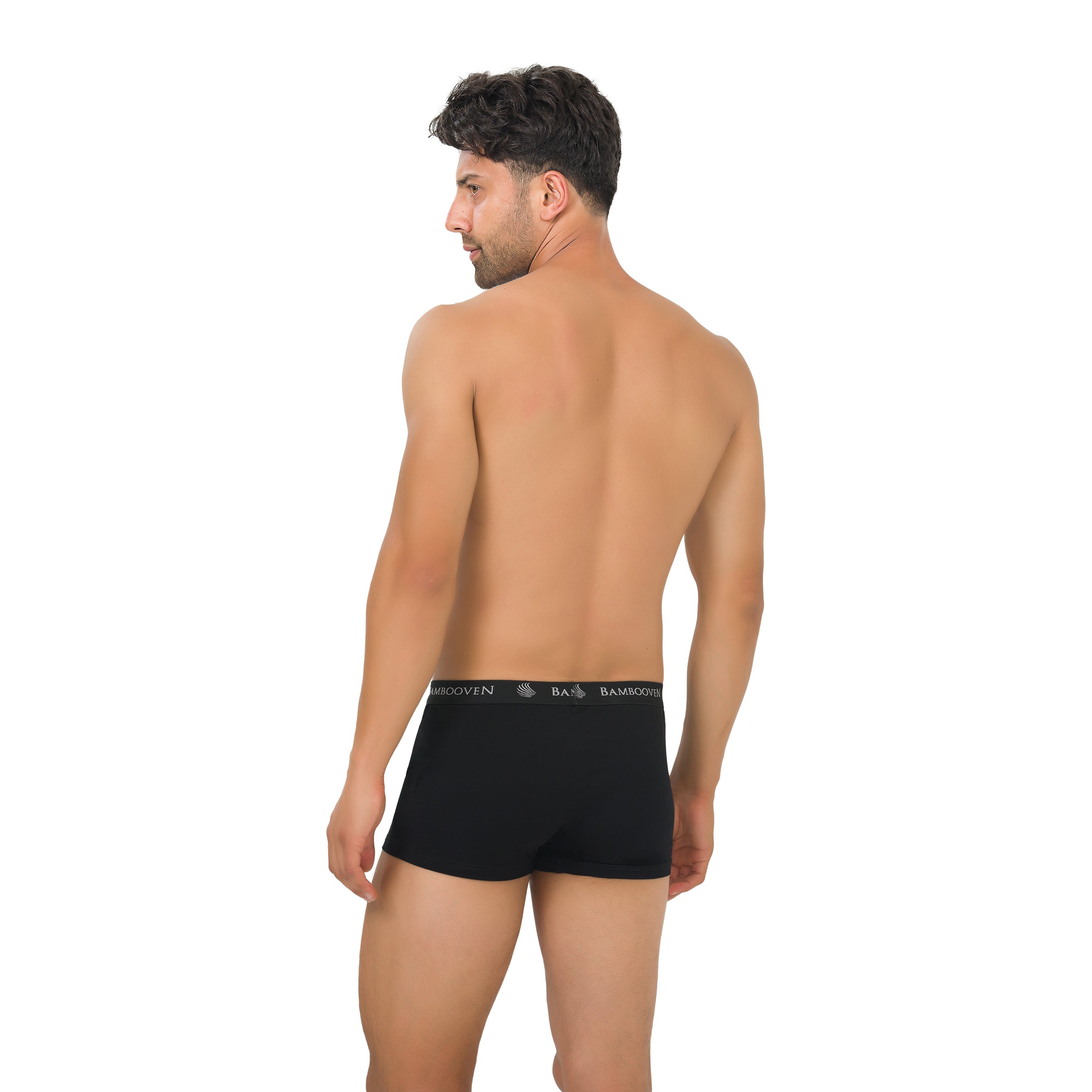 Men's bamboo boxer trunks with logo waistband, black on model, back view