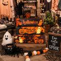 Halloween-themed butter stick gift boxes with pumpkins, bats, and ghost graphics