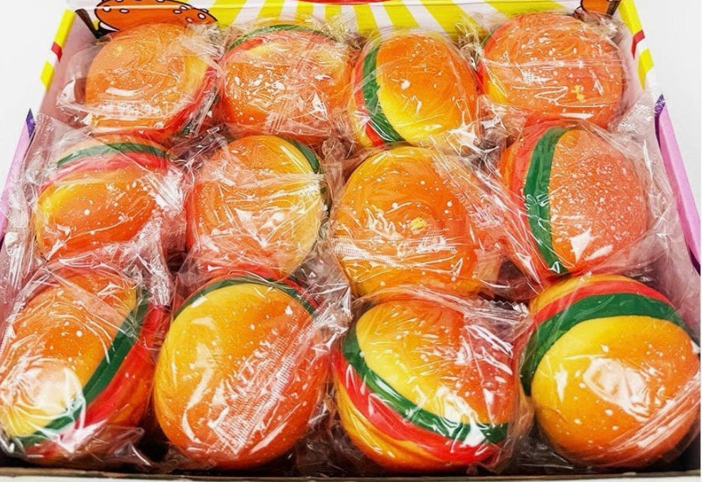 Assorted squishy hamburger stress toys in clear bag, orange buns with green lettuce
