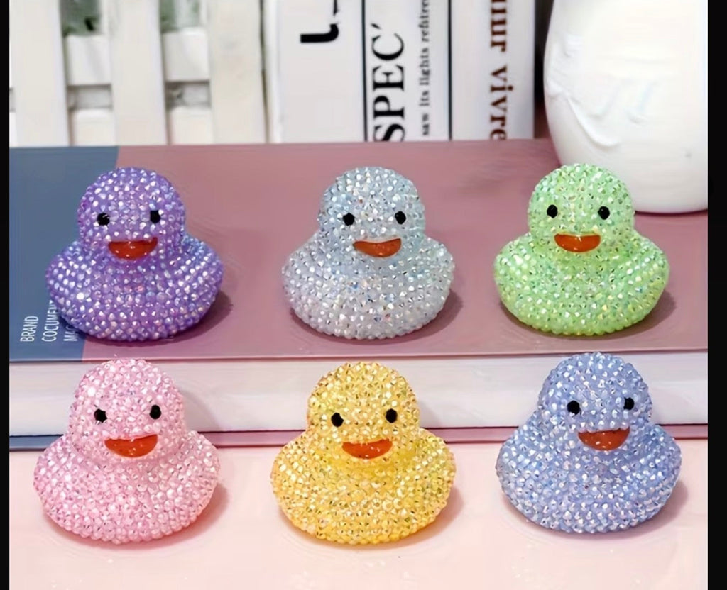 Set of glitter diamond art duck ornaments in assorted pastel colors with orange beaks