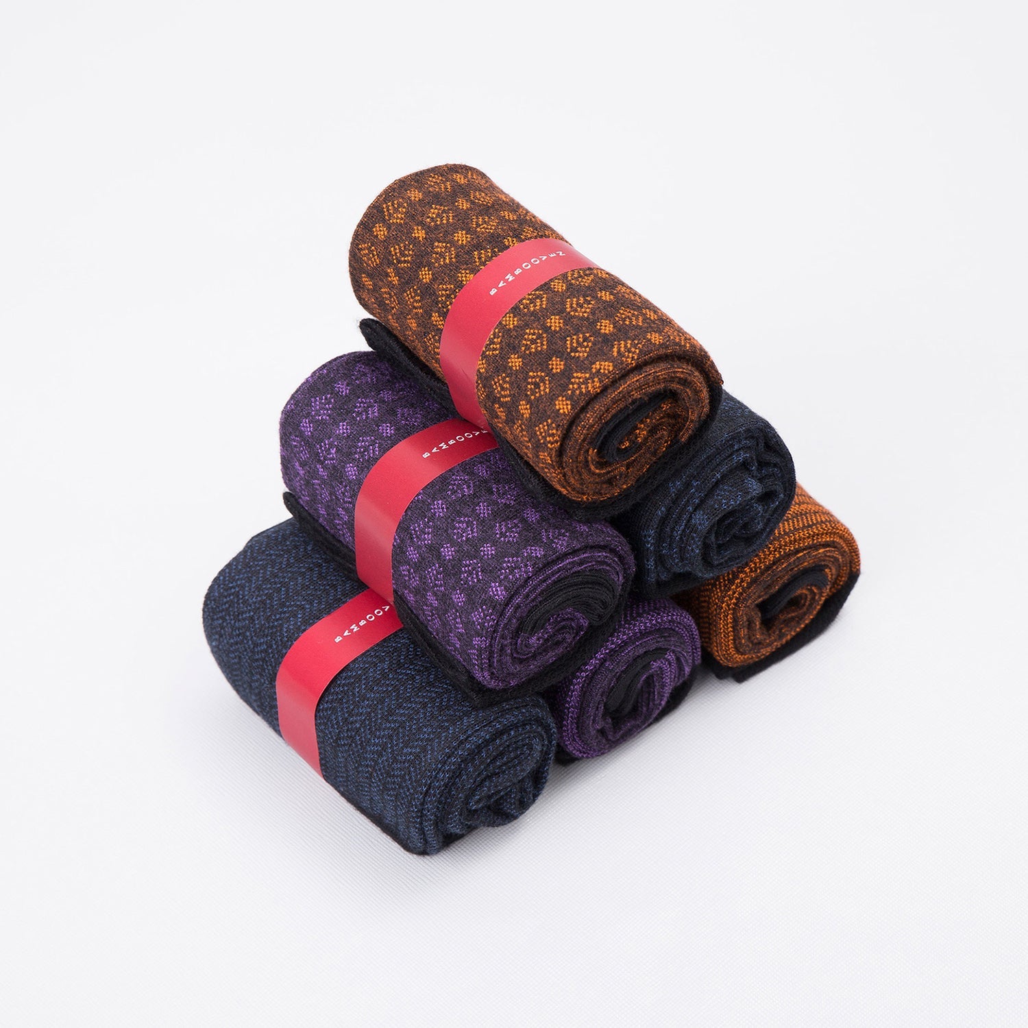 Men's bamboo dress and trouser socks 6-pack, folded rolls in brown, purple, and navy with bands