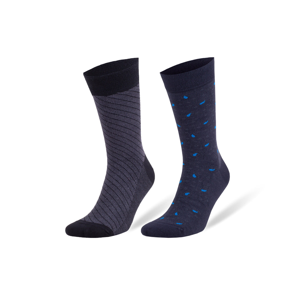 Pair of dress socks in dark navy: one ribbed knit, one with small blue dot pattern