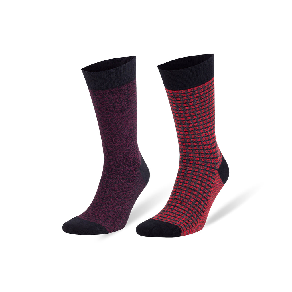 Pair of dress socks: heather maroon solid and red grid patterned with dark toe cuffs
