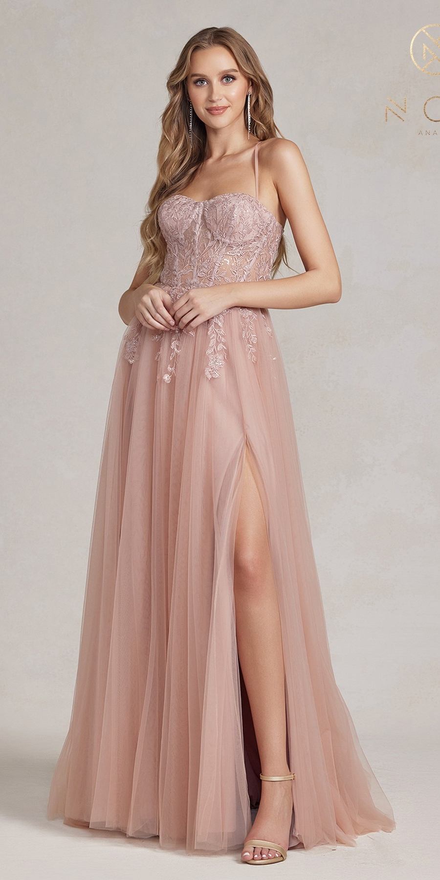 Pink A-line tulle gown with spaghetti straps, beaded bodice, front thigh slit