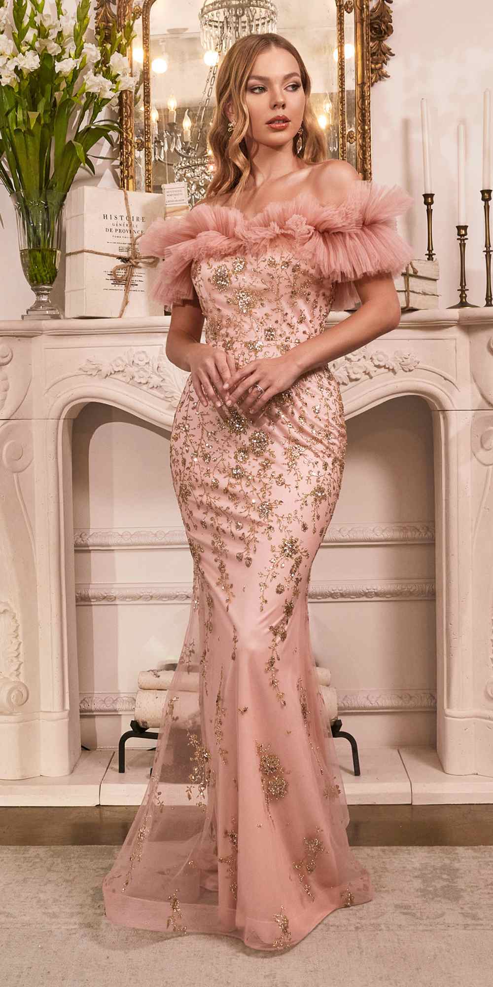 Rose gold off-shoulder fitted gown with gathered tulle ruffle sleeves and sparkling sequins