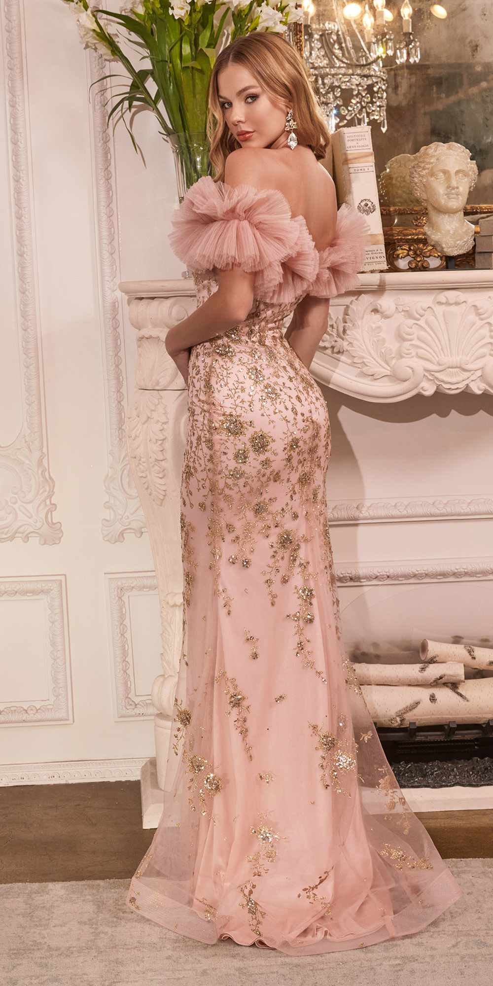 Rose gold off-shoulder fitted gown with gathered tulle ruffle sleeves and glittering sequin finish
