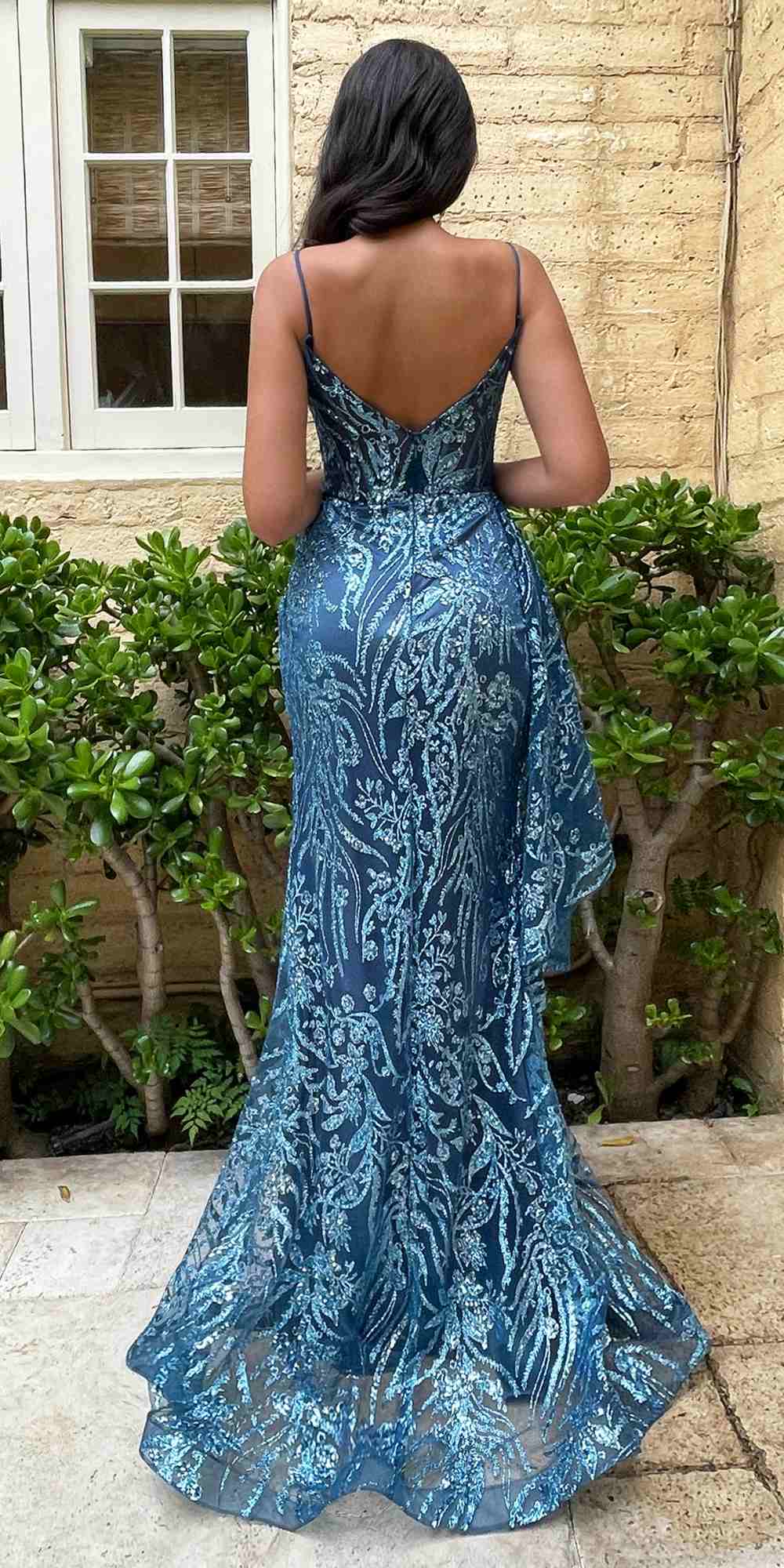 Teal and blue glitter print backless gown with low back and flared floor hem