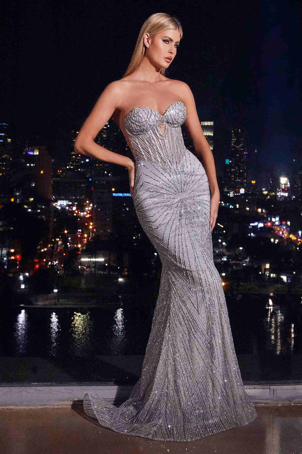 Metallic sequin strapless fitted long gown with sweetheart neckline and mermaid-style skirt.