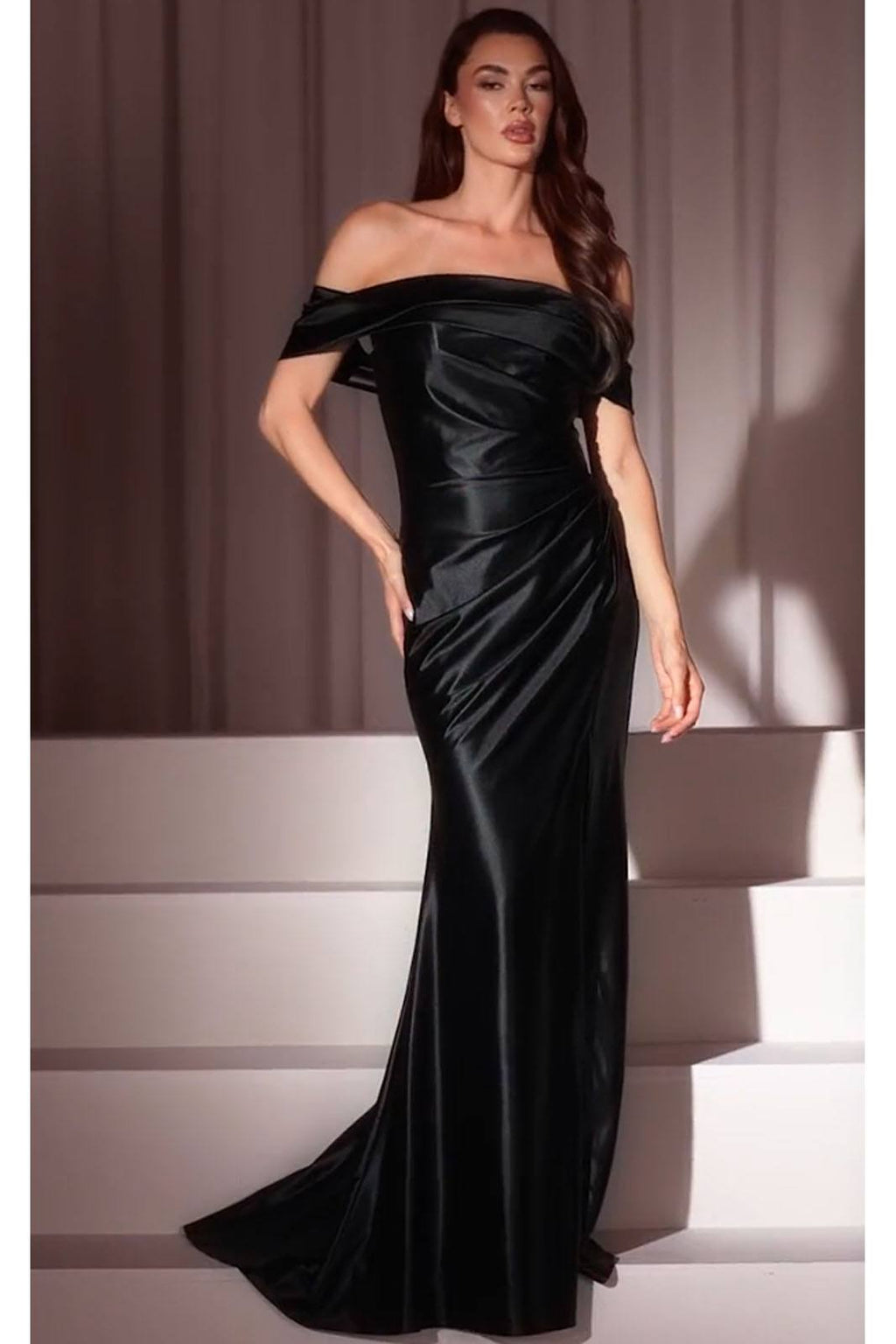 Black off-shoulder satin gown with fitted bodice and long mermaid hem
