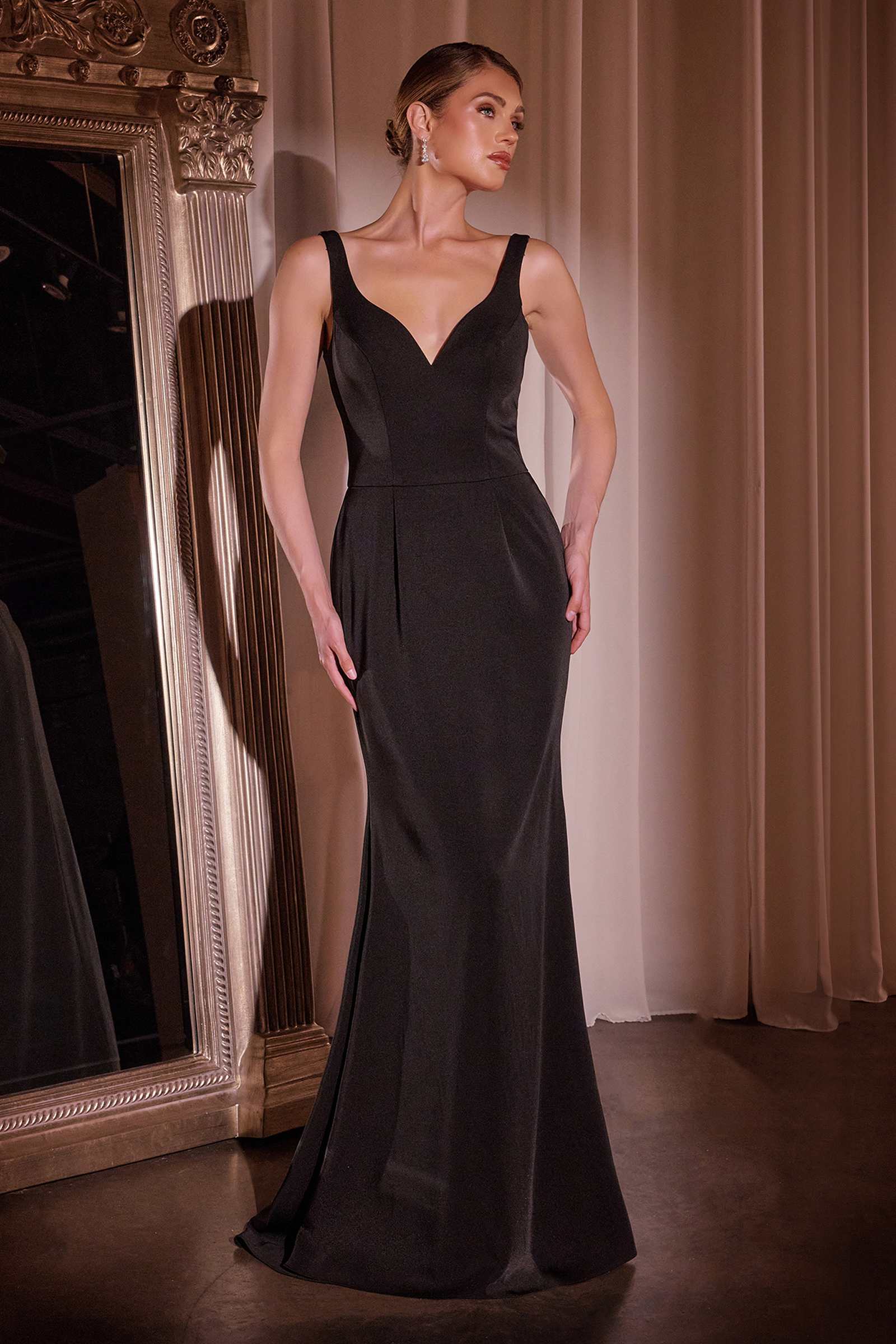 Black V-neck sleeveless crepe gown with fitted mermaid silhouette