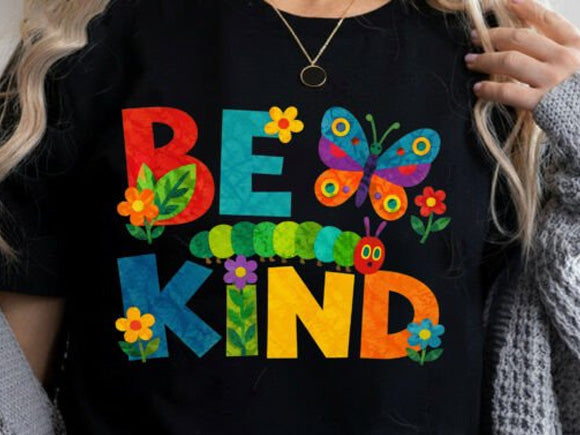 Black graphic tee with colorful BE KIND letters and butterfly flower design