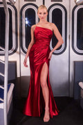 Red fitted satin gown with strapless sweetheart neckline, ruched drape and slit