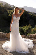 White sleeveless mermaid bridal dress with lace applique bodice and long flared skirt