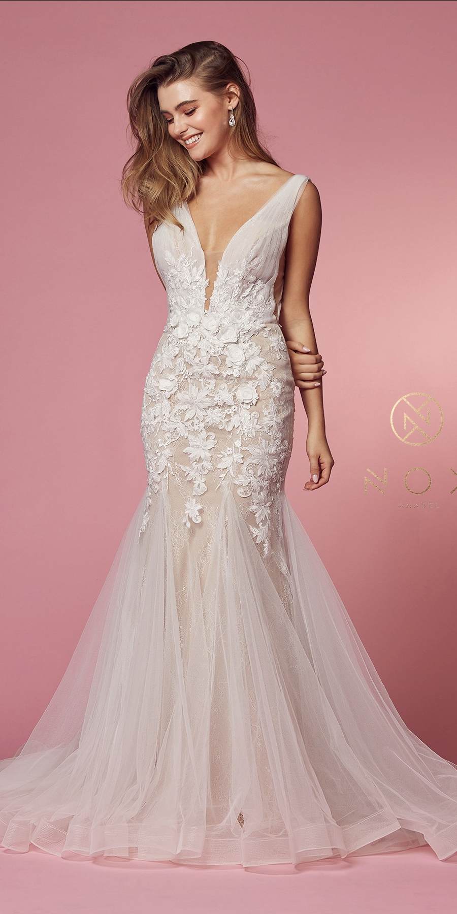 White lace mermaid wedding dress with V-neck and sleeveless tulle overlay skirt